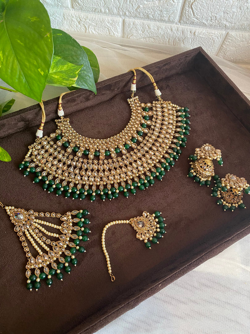 Festive Essentials - Introduces the Amira Bridal Necklace, a stunning piece with an antique gold or silver base and exquisite Polki stones adorned with captivating color beads. Don't see the color you like? Contact us on whatsapp at +1(313)727.1045 for custom options.