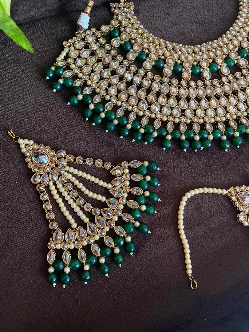 Festive Essentials - Introduces the Amira Bridal Necklace, a stunning piece with an antique gold or silver base and exquisite Polki stones adorned with captivating color beads. Don't see the color you like? Contact us on whatsapp at +1(313)727.1045 for custom options.