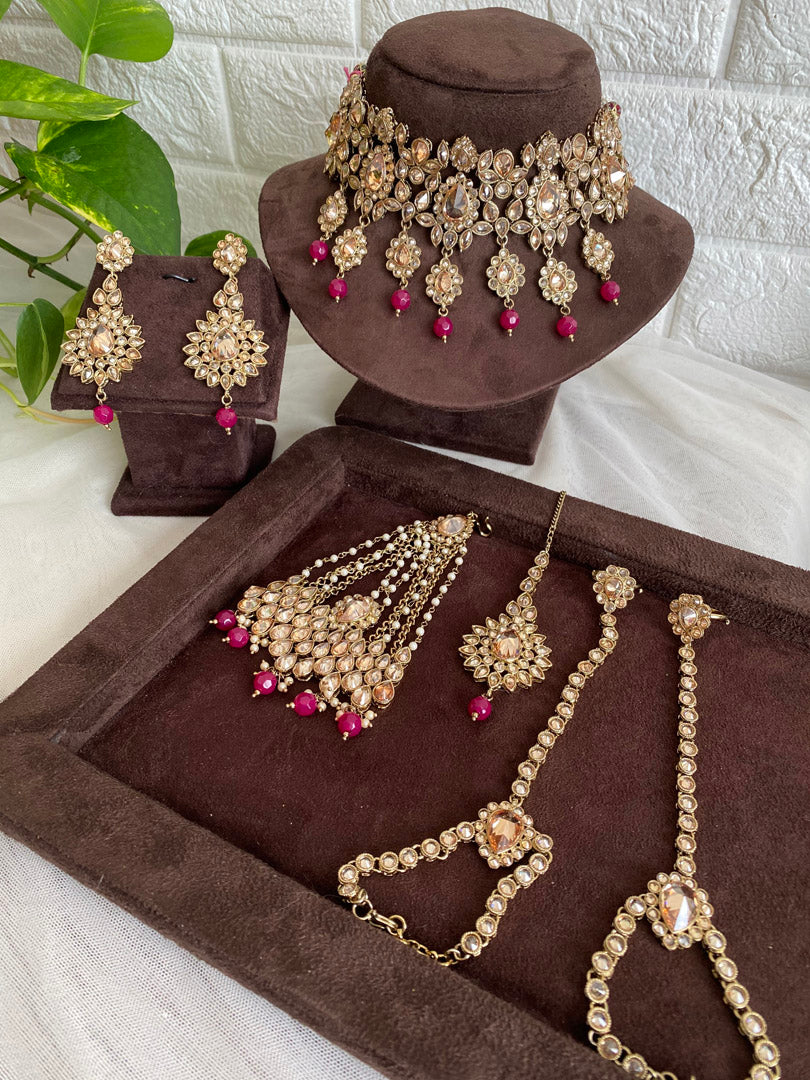 Festive Essentials - Our Anika Choker set is perfect example of our craftsmanship. This is the most unique set for any bride. More beads options are Green, Maroon, Pink, and Mint green. If you want any specific color other than mention above, and for any other inquiries please contact us on whatsapp at +1(313)-727-1045.