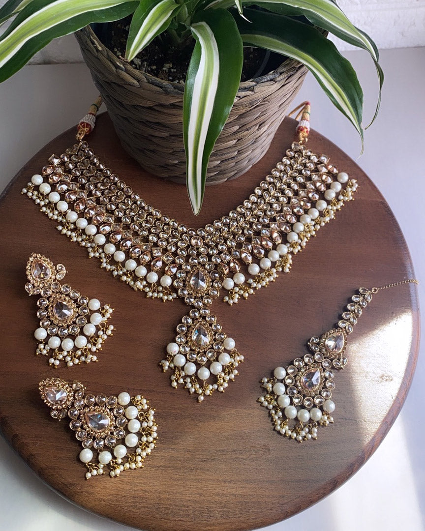 Festive Essentials - Our Natasha set is one of a kind because it is beautiful combination of many stone pattern and resulted in graceful bridal set. It comes with Necklace, Earrings, and Tikka with many color option. If you want any specific color other than mention above, and for any other inquiries please contact us on whatsapp at +1(313)7271045.